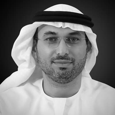 Black and white portrait of H.E. Eng Shadi Malak, Chief Executive Officer at Etihad Railway.